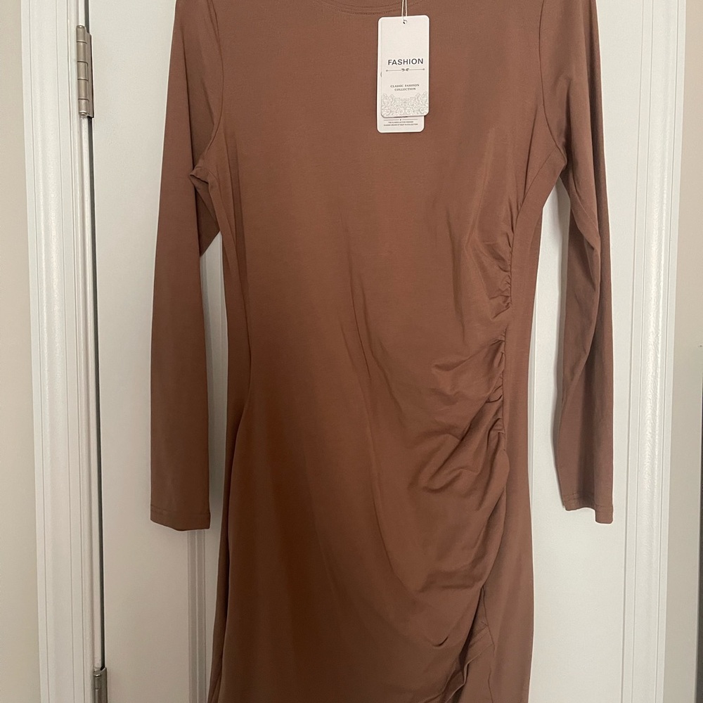 Bodycon dress with side ruching.  NWT.